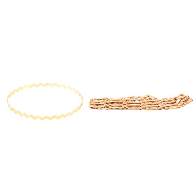Lot 185 - A 9 carat gold gate link bracelet and a 9 carat gold slave bangle.