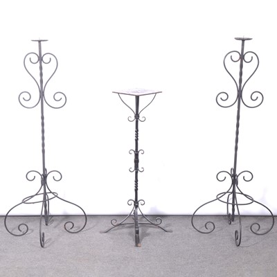 Lot 340 - Pair of standard pricket candlesticks and a plant stand