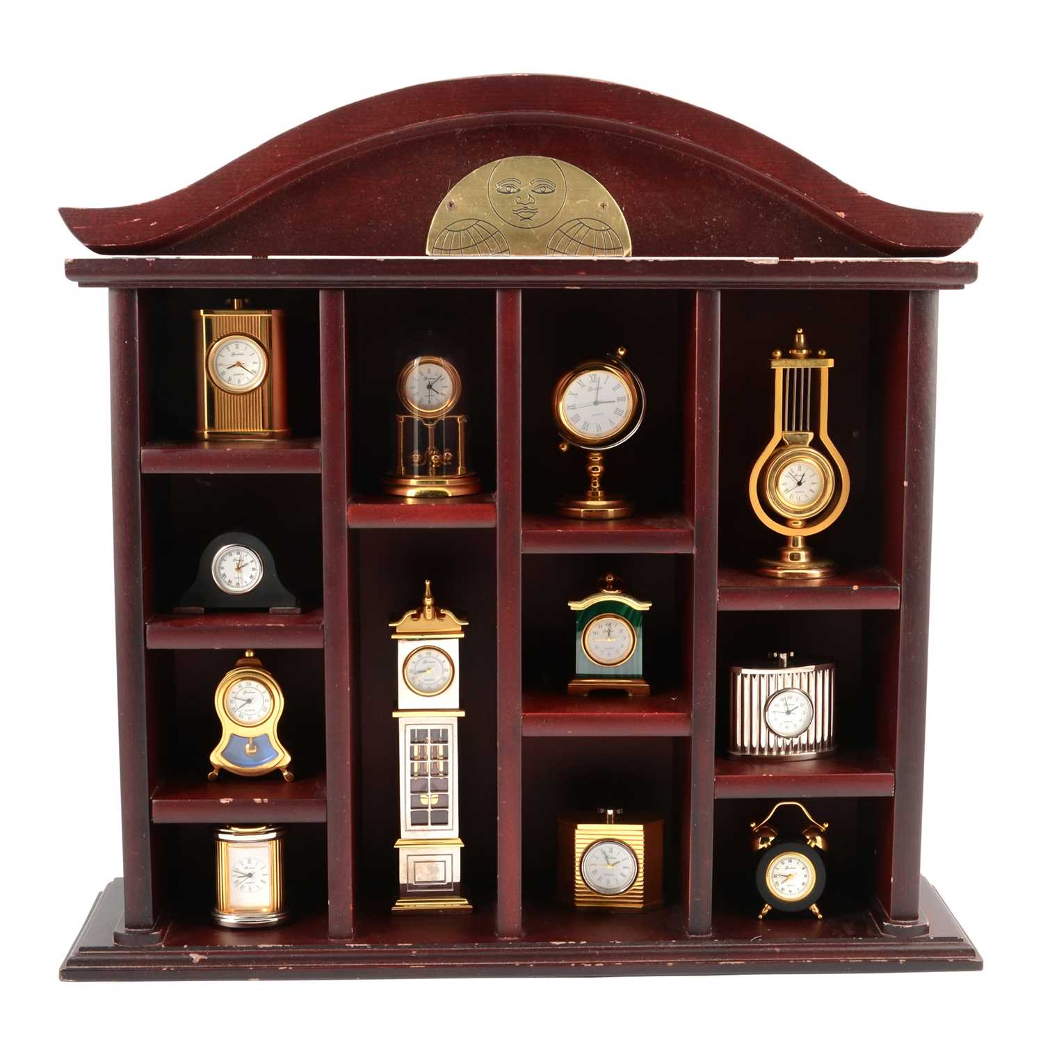 Lot 264 - Collection of twelve miniature clocks in stained wood display stand