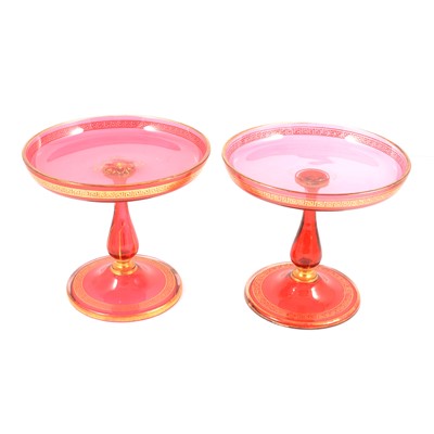Lot 10 - Pair of Victorian cranberry glass tazza, gilt.