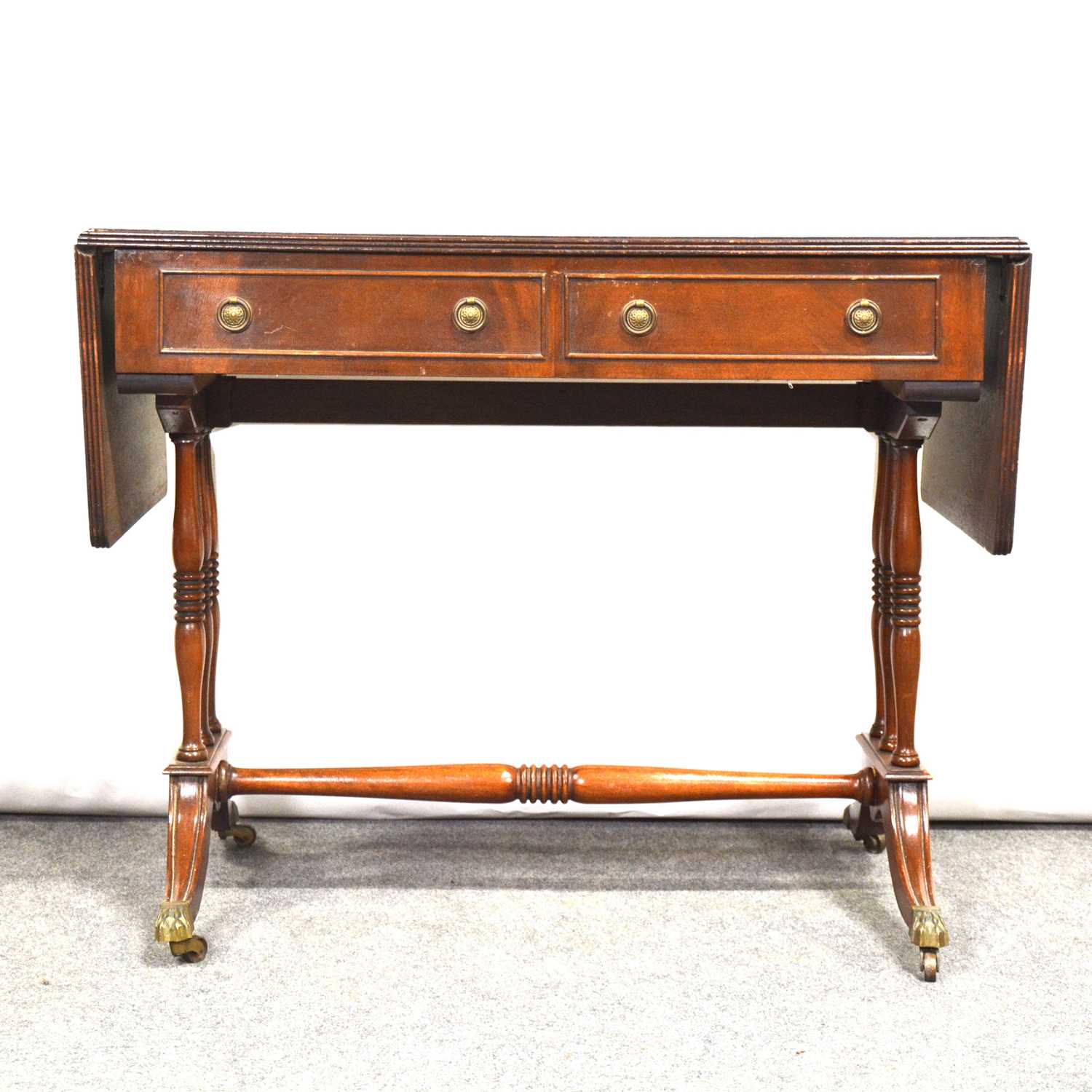 Lot 437 Reproduction mahogany sofa table,