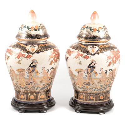 Lot 98A - A pair of Chinese pottery covered vases