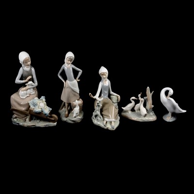 Lot 101 - Six Lladro figural groups with girls and farm animals, and other figures