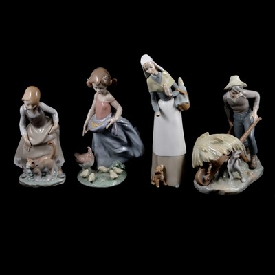 Lot 52 - Collection of Lladro figures, table bells, and other figures.