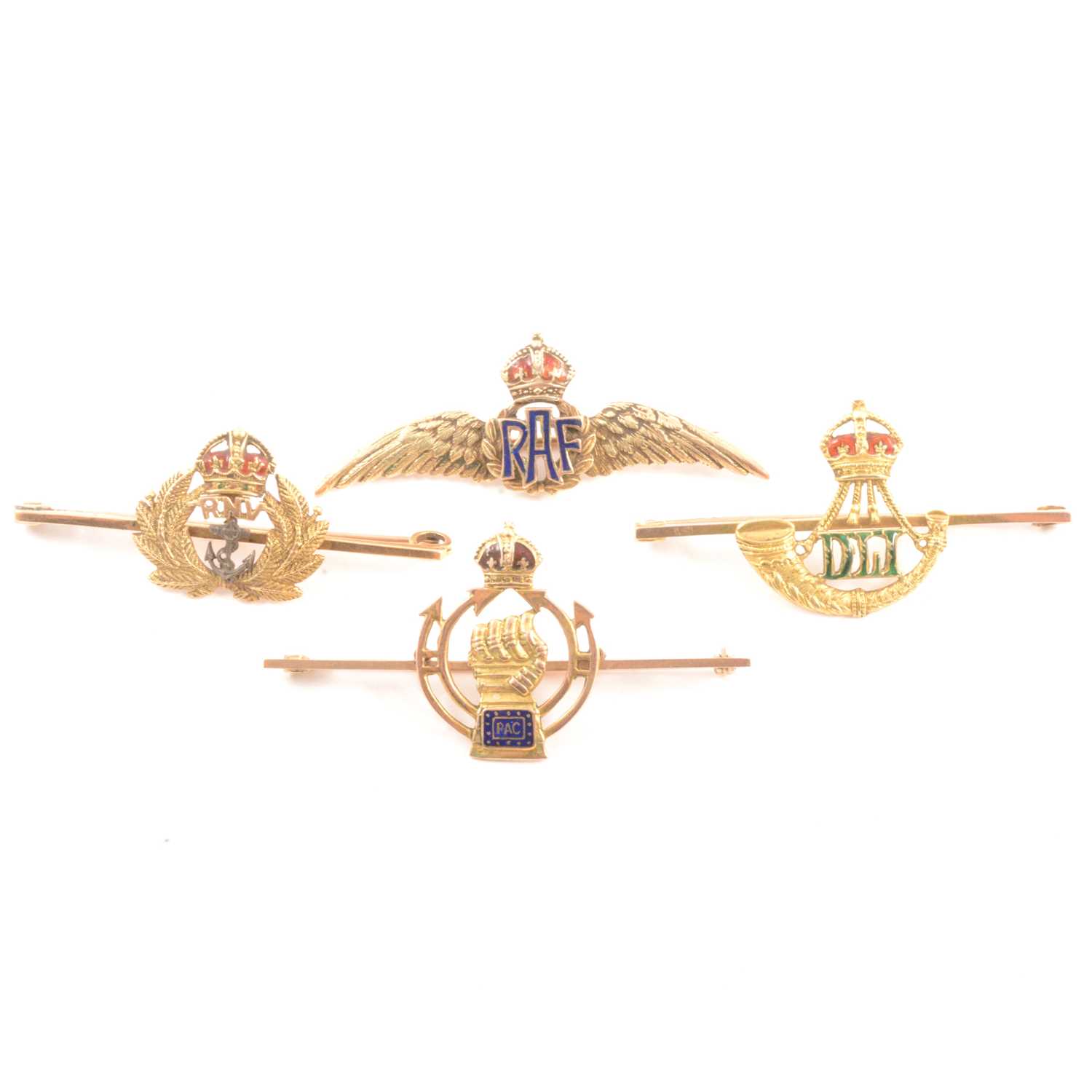 Lot 265 - Four yellow metal military brooches.