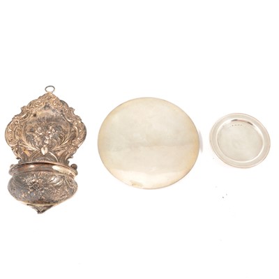 Lot 298 - Two silver communion patens, and a silver holy water stoop.