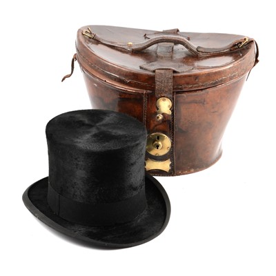 Lot 246 - An early 20th century black silk top hat, by G A Dunn & Co, in a leather case