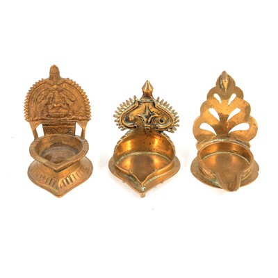 Lot 193 - Three Asian brass spirit lamps