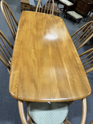 Lot 429 - Ercol dining table and six Quaker dining chairs