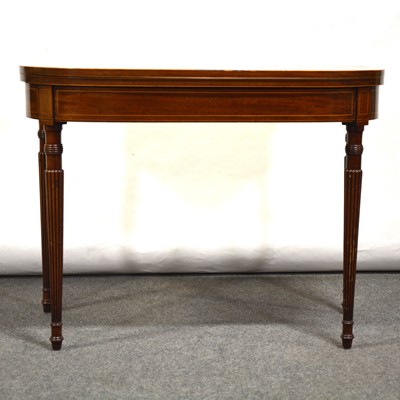 Lot 454 - George III mahogany fold-over tea table