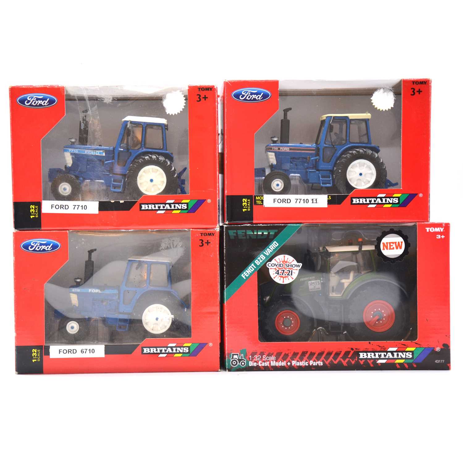 Lot 1226 - Four Britains model tractors, boxed.
