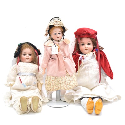 Lot 1011 - Three German bisque head dolls, including Simon and Halbig.