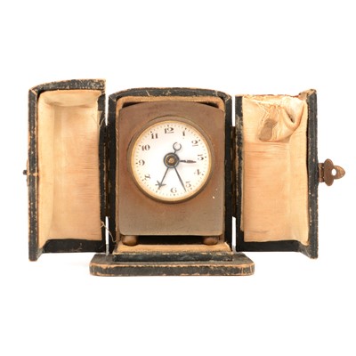 Lot 129 - Small French brass travel clock.