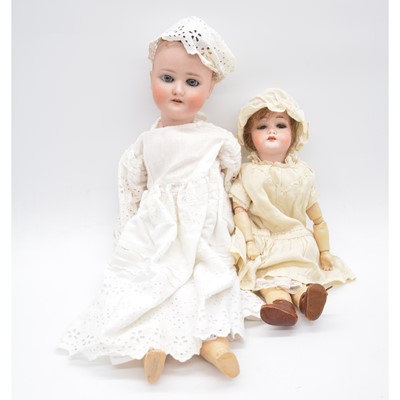 Lot 1006 - Schoenau & Hoffmeister bisque head doll, 1909 head stamp and one other.
