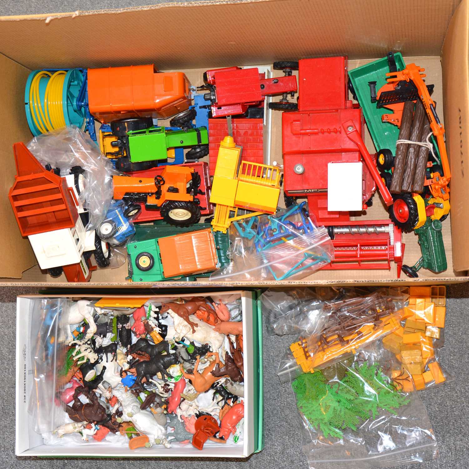 Lot 1227 - One box of Britains farm toys, one box including MB Teac 1500 tractor