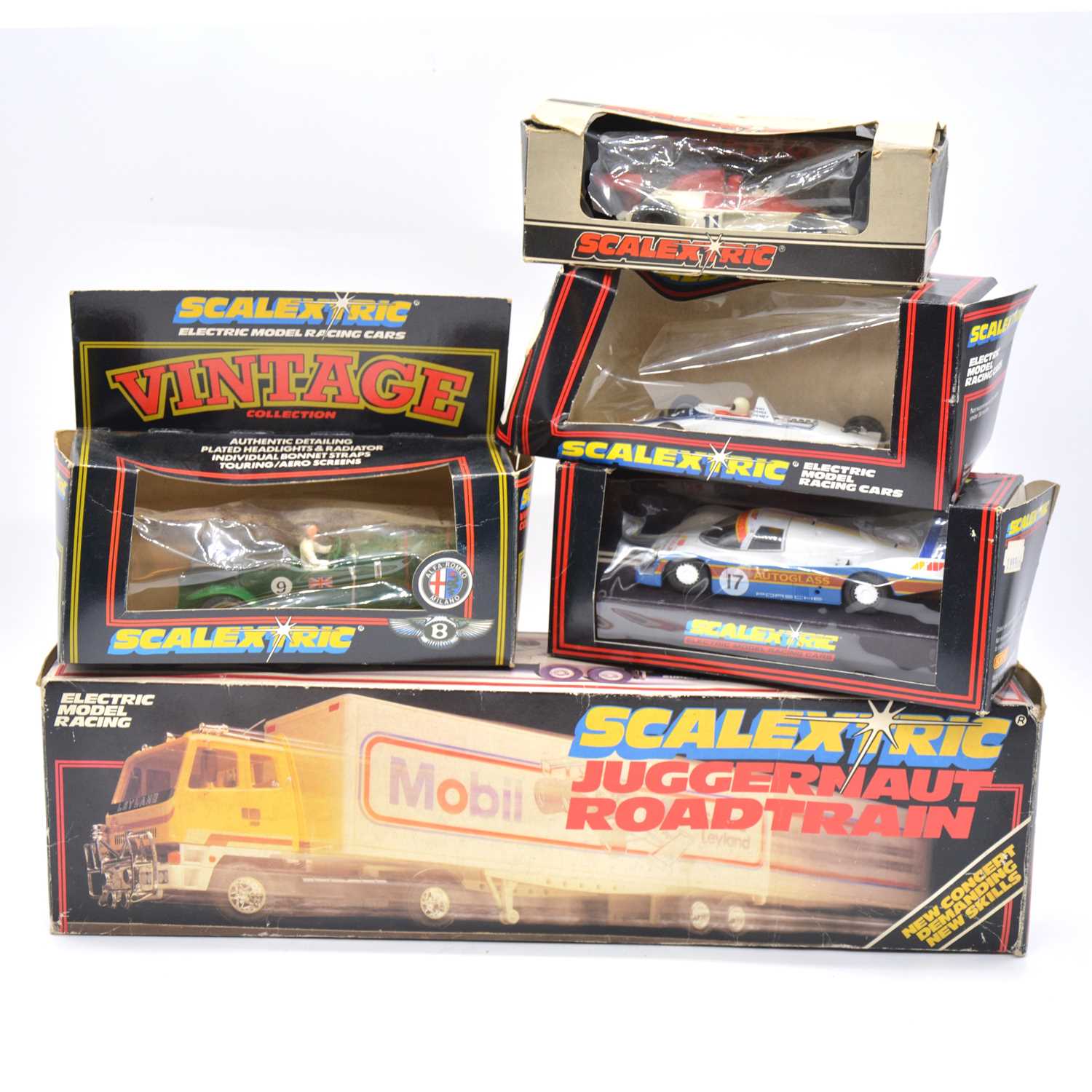 Lot 1247 - Five Scalextric slot-car racing vehicles including Leyland 'Mobil' lorry etc.