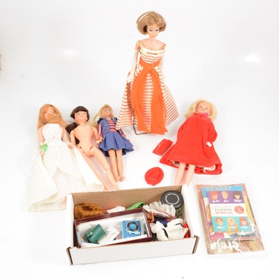 Lot 1016 - 1960s fashion dolls, clothing and accessories; including Barbie Skipper and Tressy.