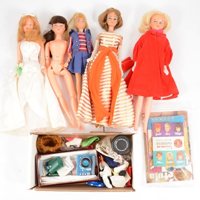 Lot 1016 - 1960s fashion dolls, clothing and accessories; including Barbie Skipper and Tressy.