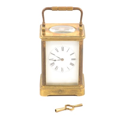 Lot 135 - A  French carriage style clock striking on the hour and half hour.