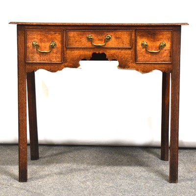 Lot 408 - George III oak and mahogany lowboy