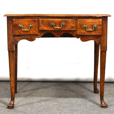 Lot 404 - George III elm lowboy