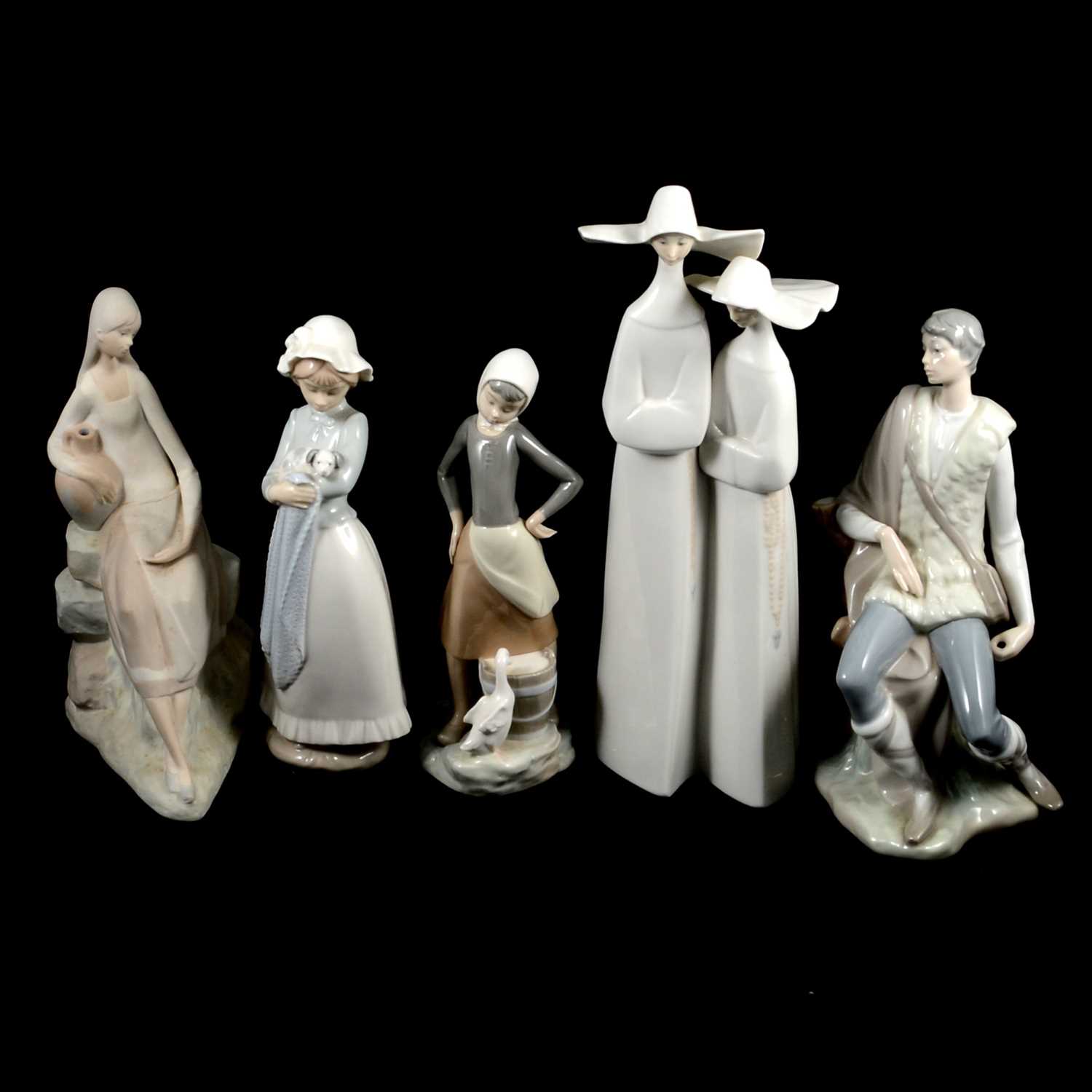 Lot 42 Eleven Lladro and Nao figurines