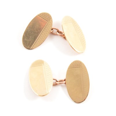 Lot 284 - A pair of 9 carat yellow gold cufflinks, Birmingham 1984.