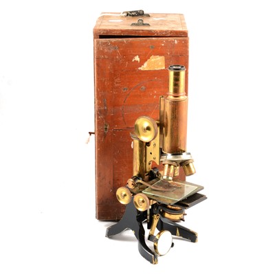 Lot 240 - Early 20th century brass microscope by J.Swift & Son