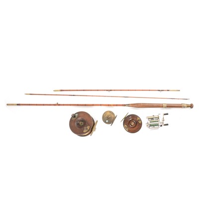 Lot 225 - Four vintage fishing reels and a three piece cane rod