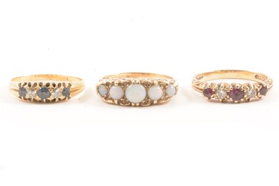 Lot 114 - Three gemset rings.