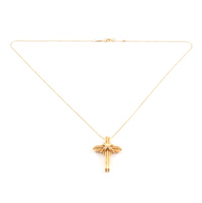 Lot 226 - Tiffany - a Signature X 18 carat yellow gold cross and chain.