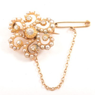 Lot 256 - A diamond and seed pearl brooch.