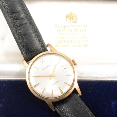 Lot 346 - Garrard - a gentleman's yellow metal presentation wristwatch.