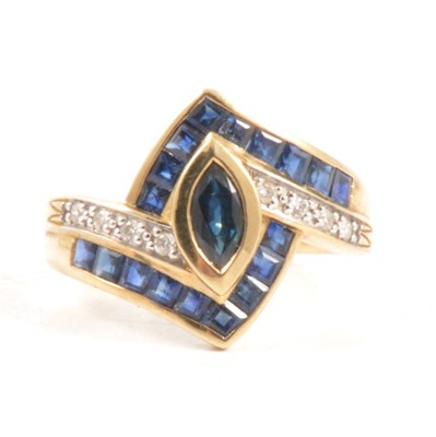 Lot 52 - A sapphire and diamond ring.