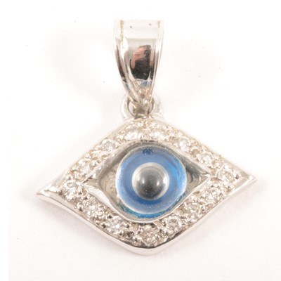 Lot 232 - An 18 carat white gold Eye charm.