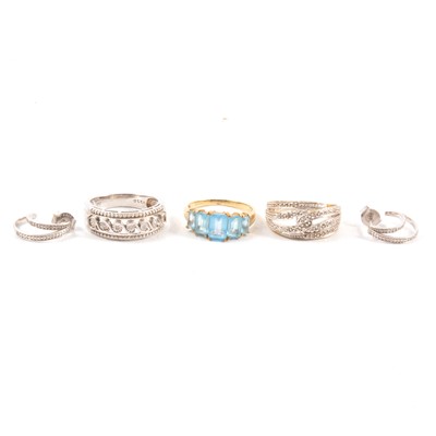 Lot 38 - Three gemset dress rings and a pair of earrings.