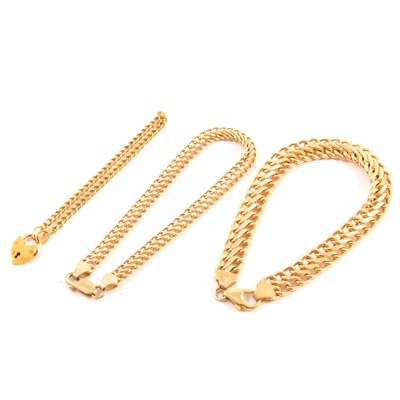 Lot 184 - Three 9 carat yellow gold bracelets.