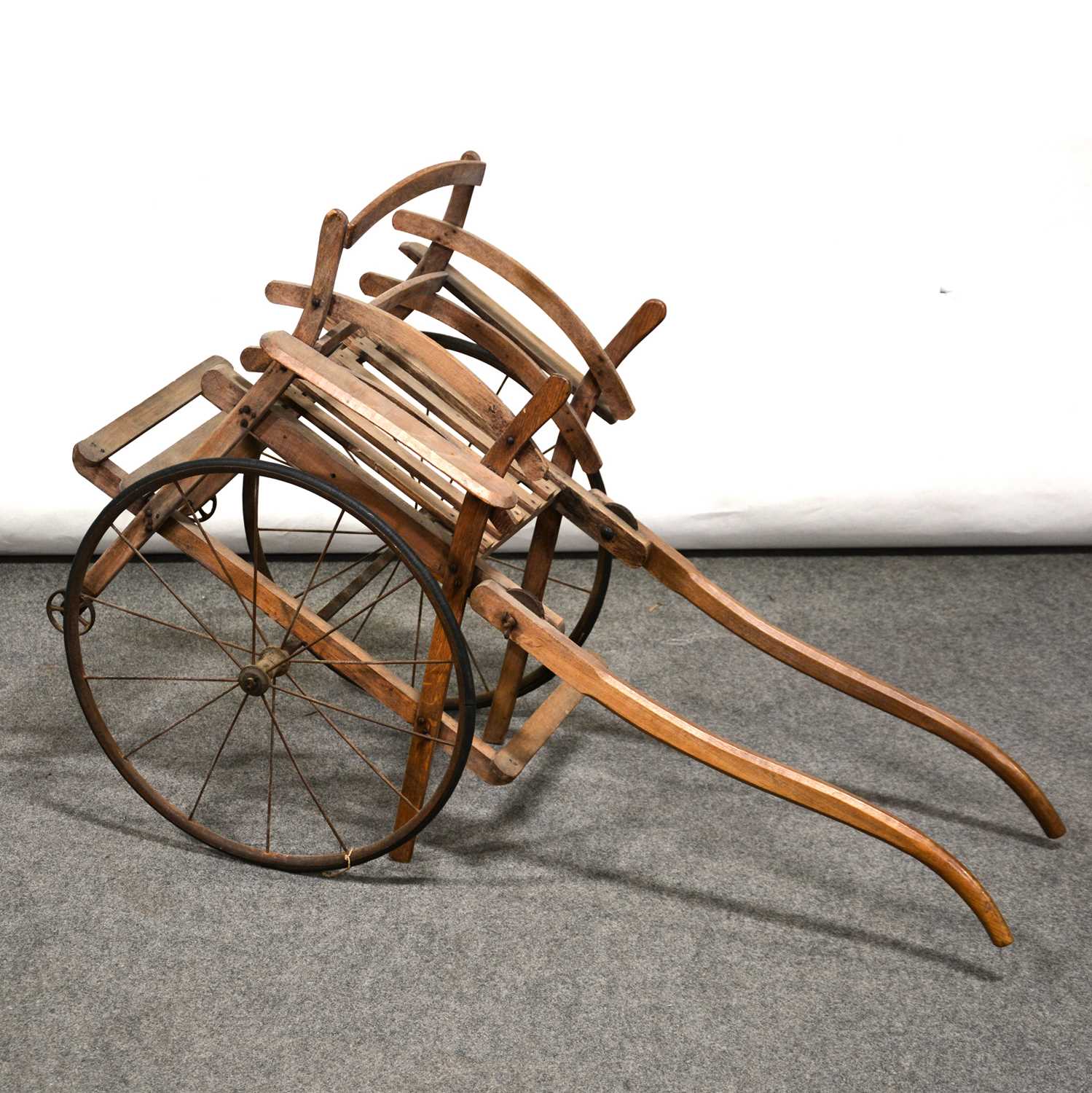 Lot 393 - Vintage beech child's pull-along cart.