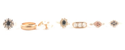 Lot 117 - A 9 carat rose gold wedding band, and six gemset rings.