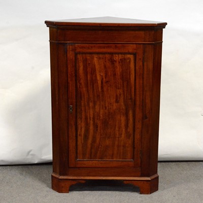 Lot 484 - Georgian mahogany freestanding corner cupboard