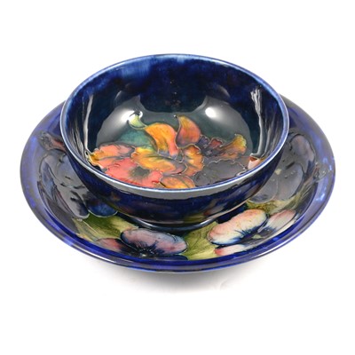 Lot 30 - William Moorcroft - a Pansy shallow dish, and an Orchid bowl
