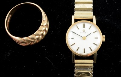 Lot 385 - Omega - a lady's presentation wristwatch and 9 carat gold ring.