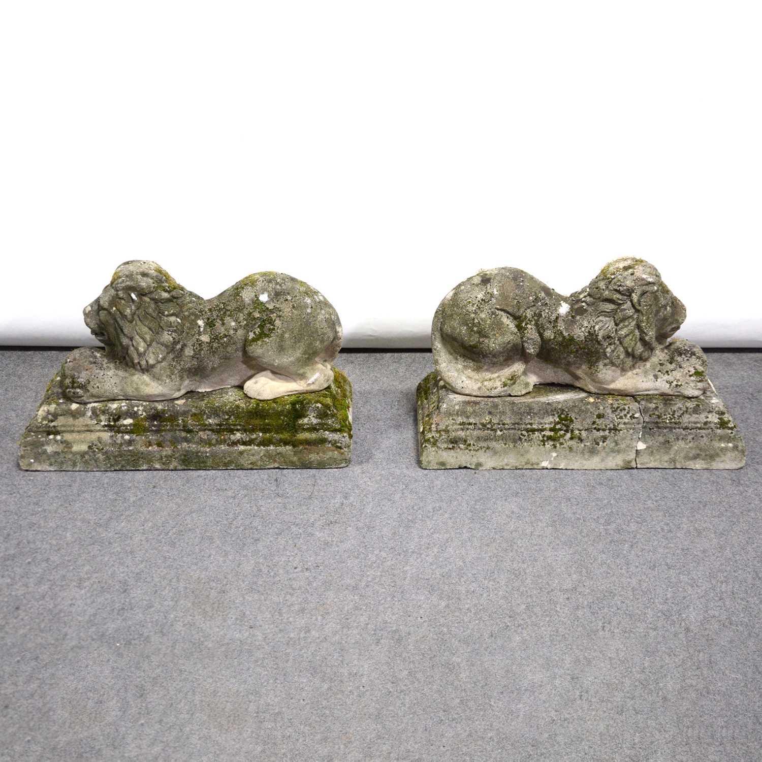 Lot 594 Pair of reconstituted stone garden statues,