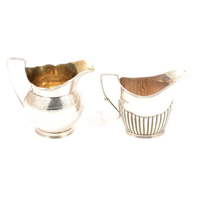 Lot 427 - Two silver cream jugs