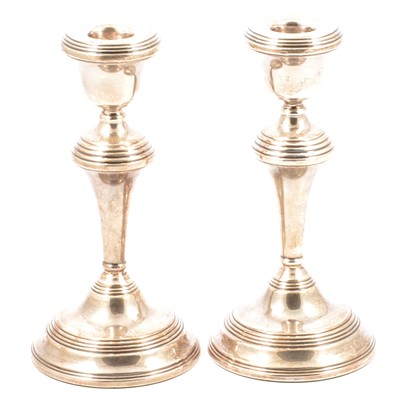 Lot 428 - Pair of silver table candlesticks