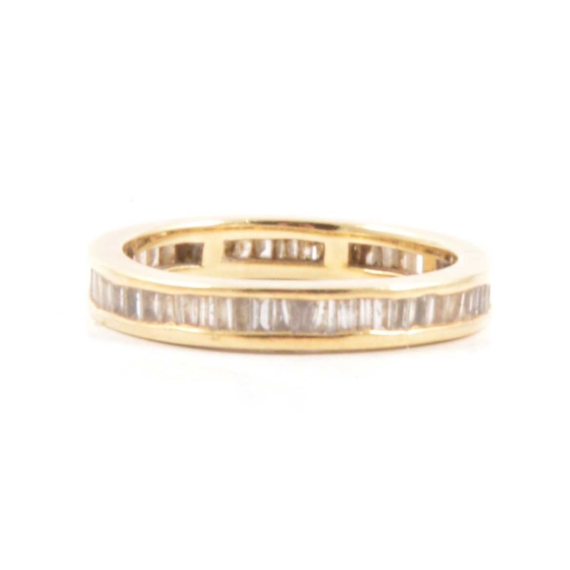 Lot 31 - A diamond full eternity ring.