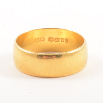 Lot 105 - A 22 carat yellow gold wedding band.