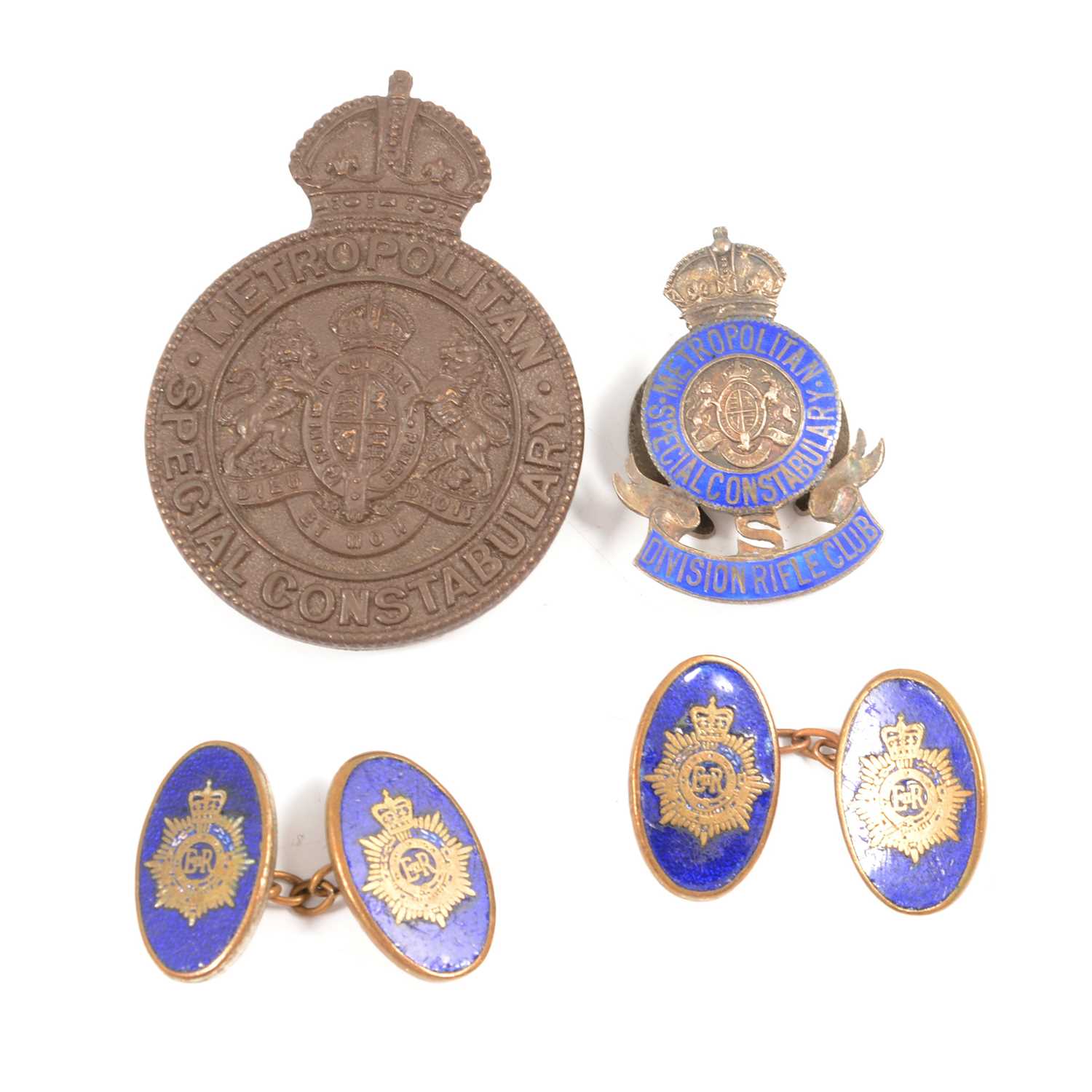 Lot 256 - Metropolitan Constable silver and enamel badge, one other and a pair of cufflinks