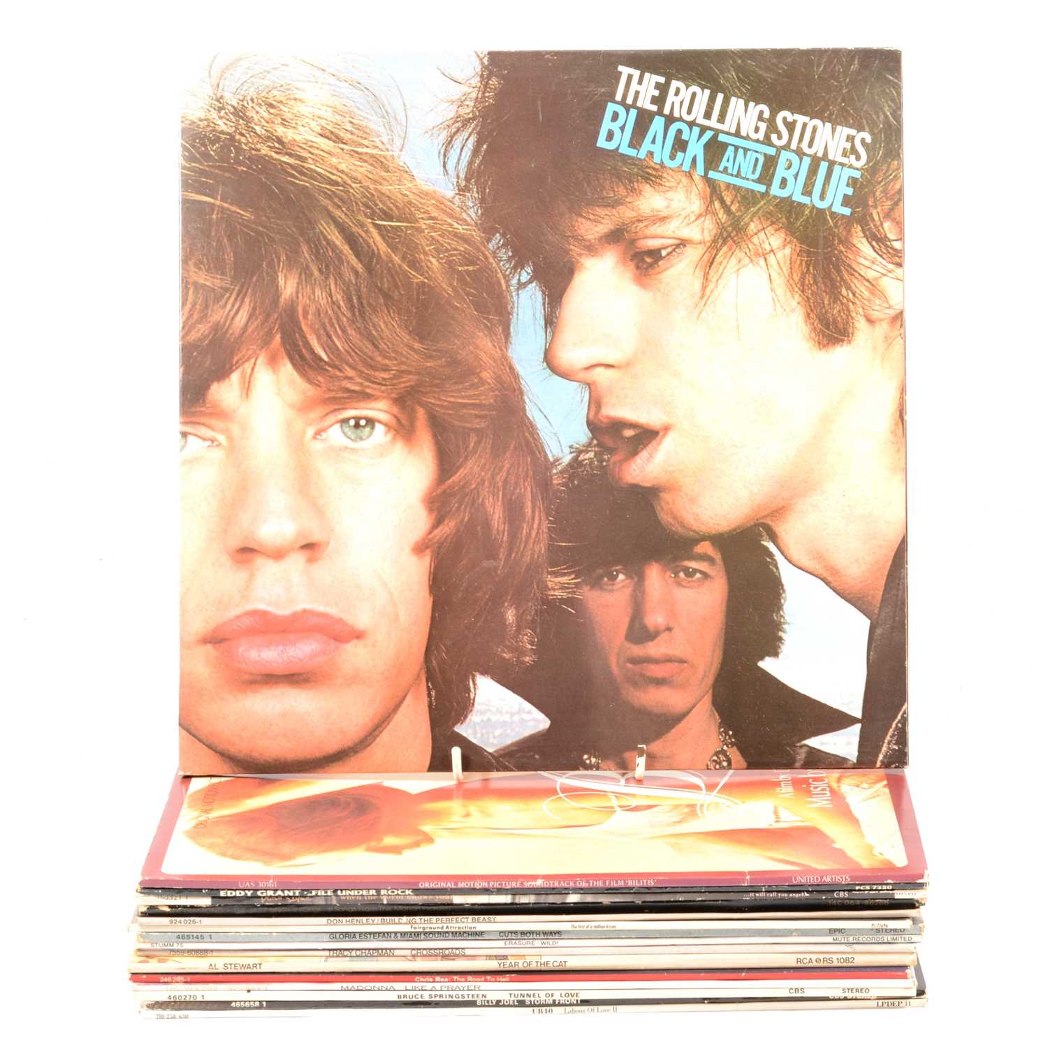 Lot 201 - Sixteen LP vinyl music records, including the Rolling Stones, Billy Joel, UB40 etc.