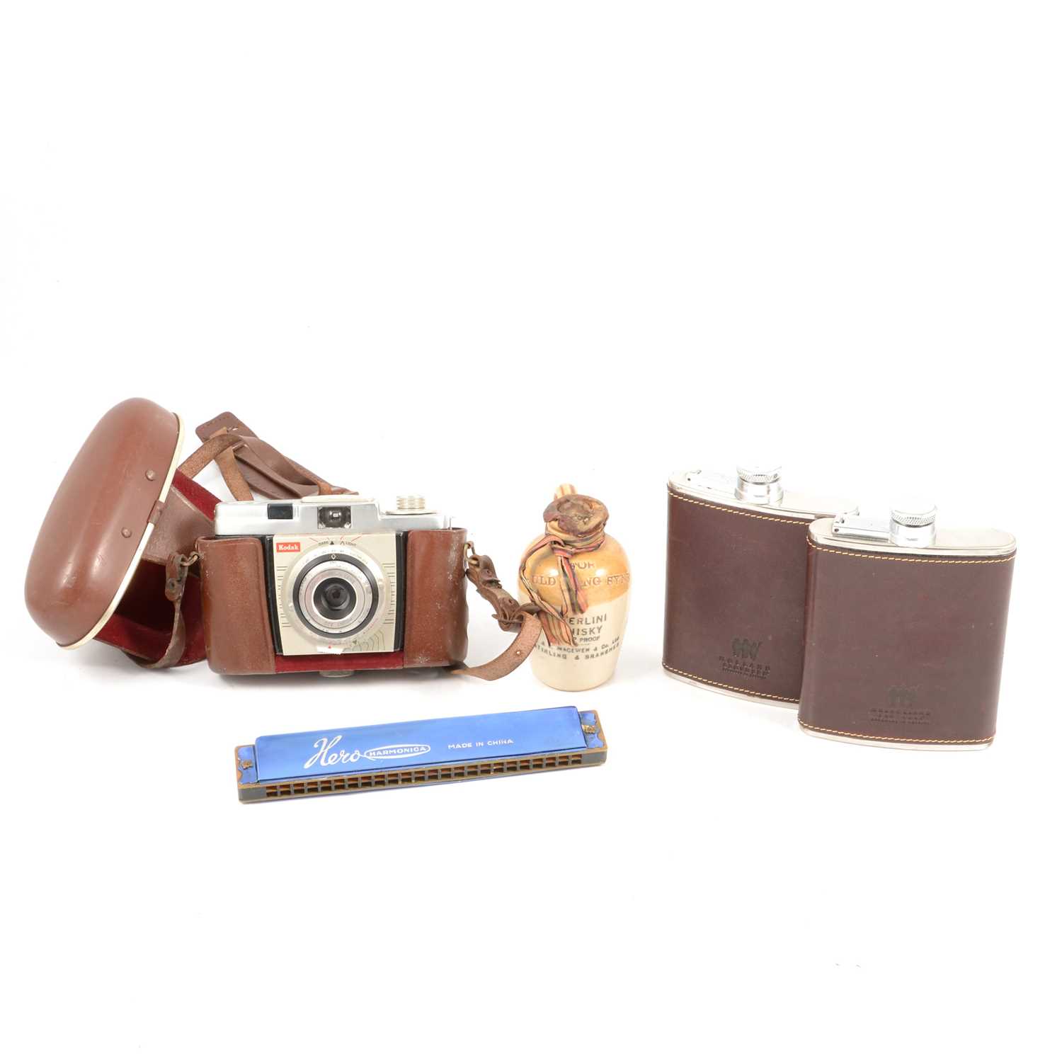 Lot 194 Zeiss Ikon folding camera, Sterlini Whisky